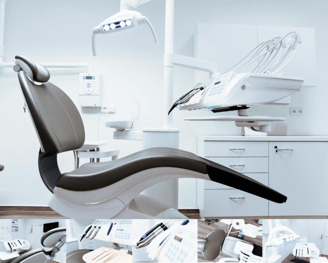 Modern dental office interior with high-tech equipment and comfortable seating.